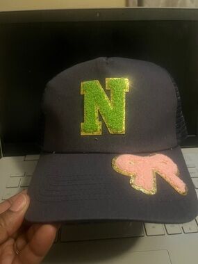 N Appliqué Navy Trucker Hat with Green and Pink Accents